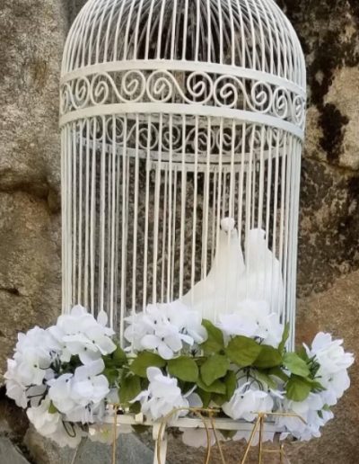 A touching tribute to a loved one, with a dove release and floral arrangements