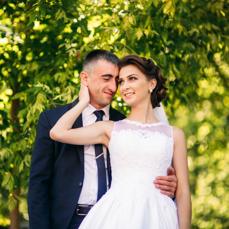 A sense of hope and renewal, conveyed through the image of doves flying into a beautiful sunset